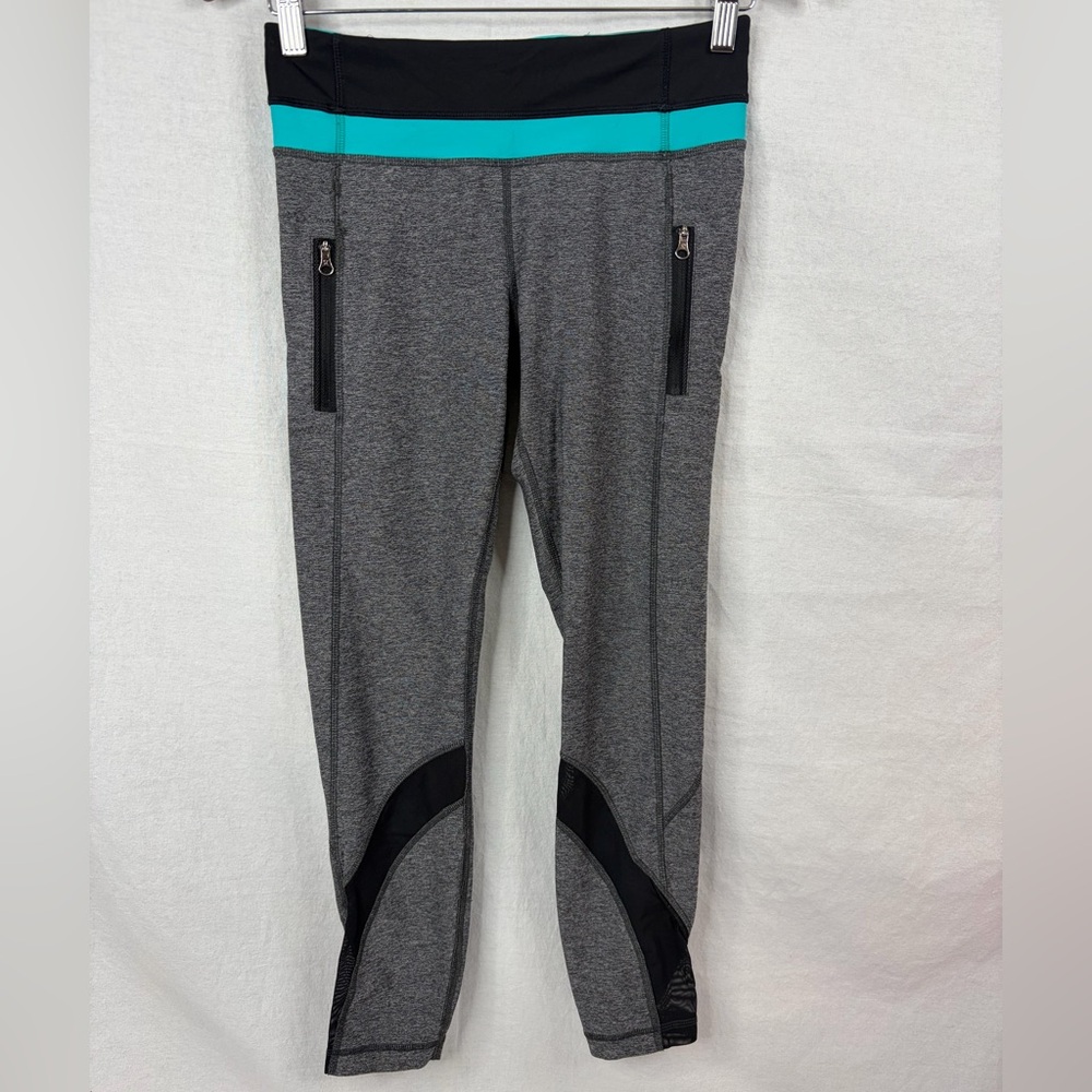 Lululemon Inspire Tight II (Mesh)7/8 length
Black/striped blue waistband size 6